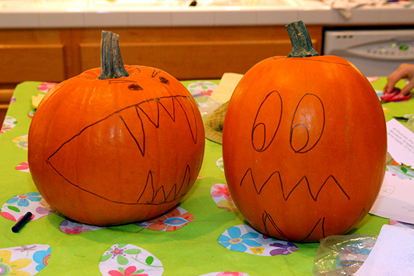 Pacman and Ghost pumpkins with ink outline